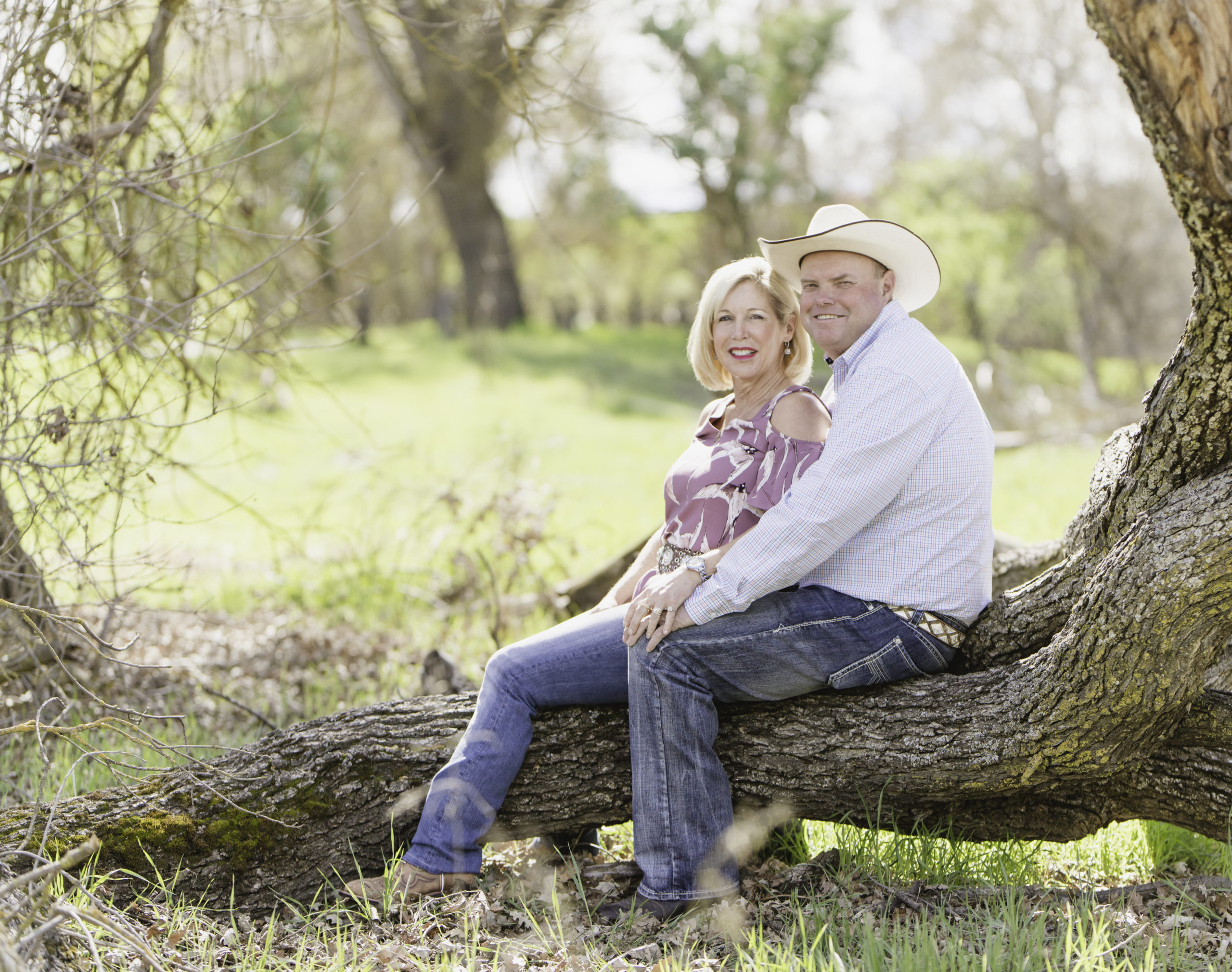 couple posing in a tree