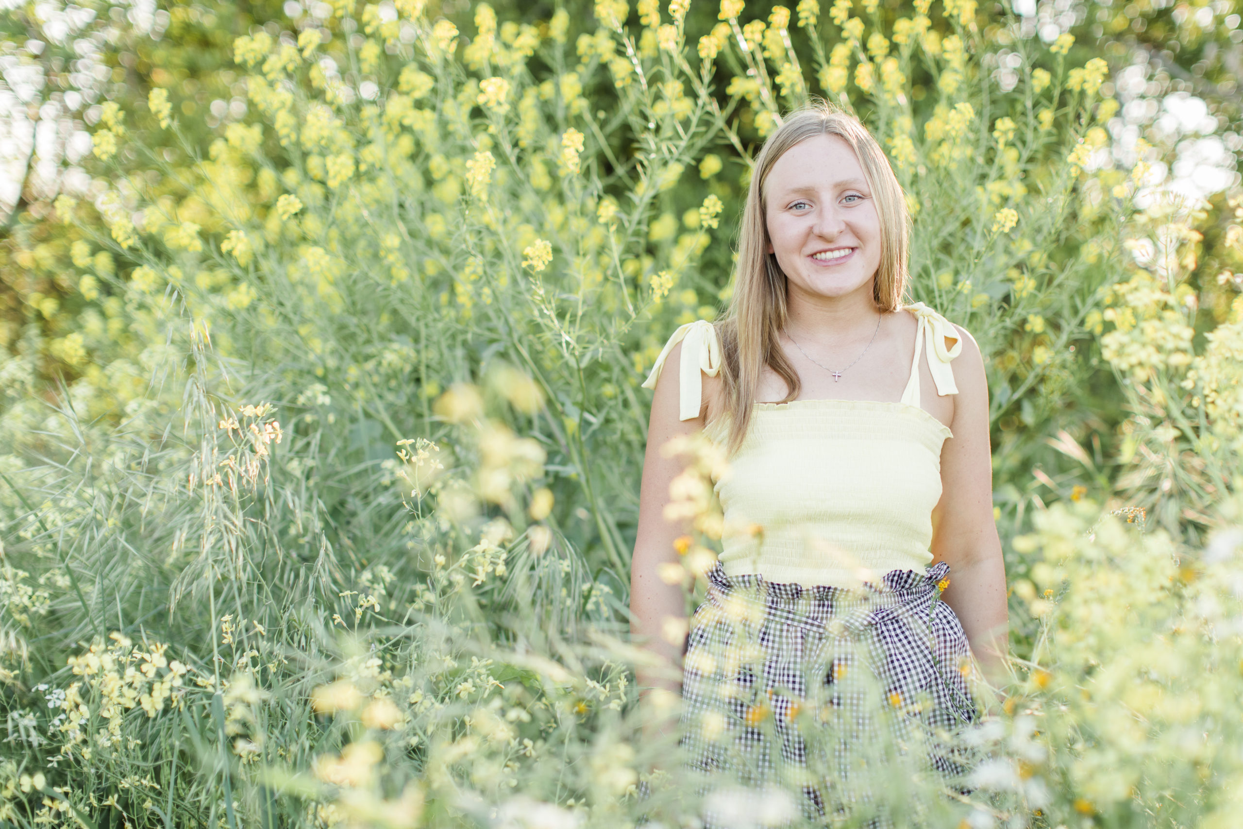 girl posing in a field