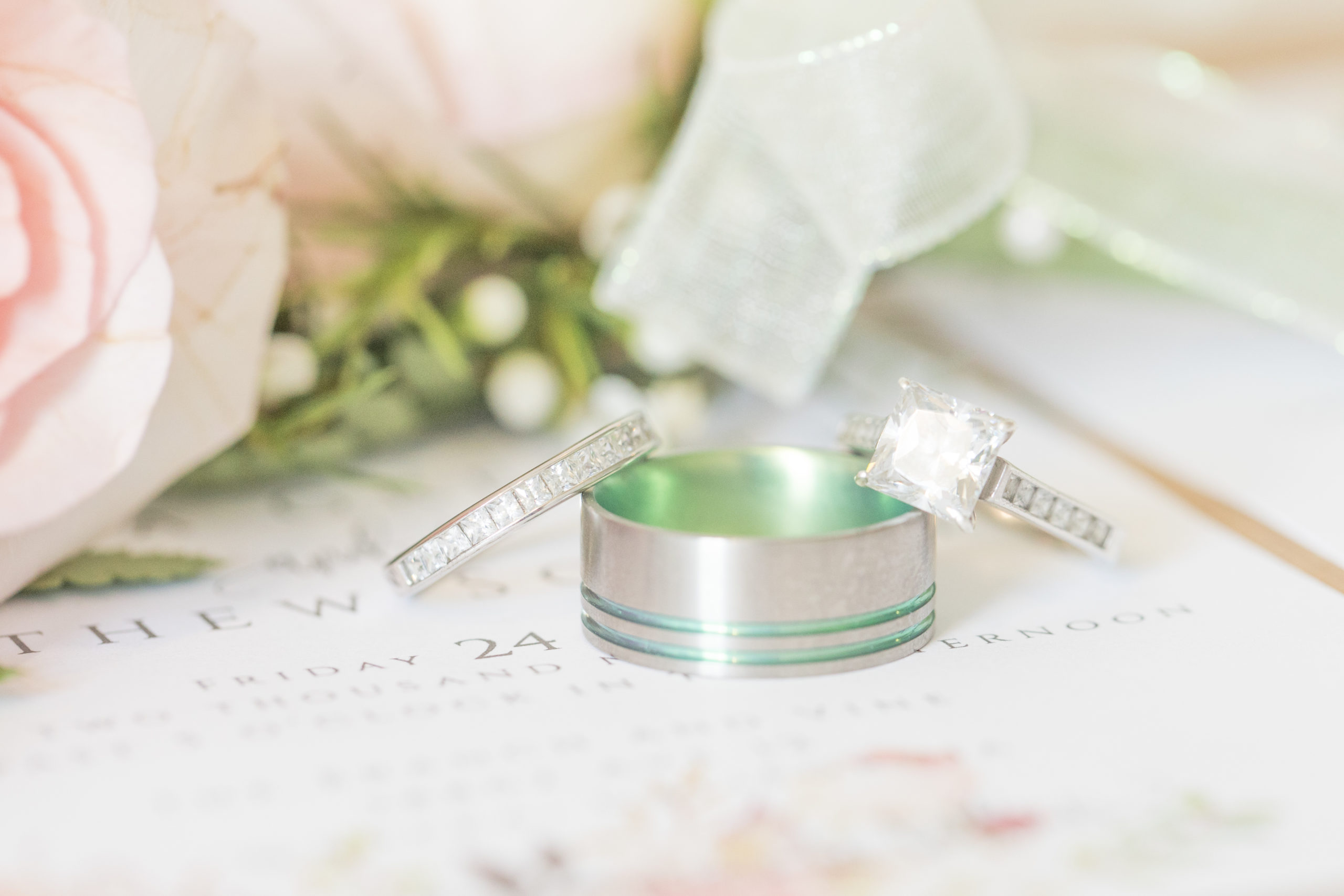 A teal Branch and Vine Wedding wedding rings