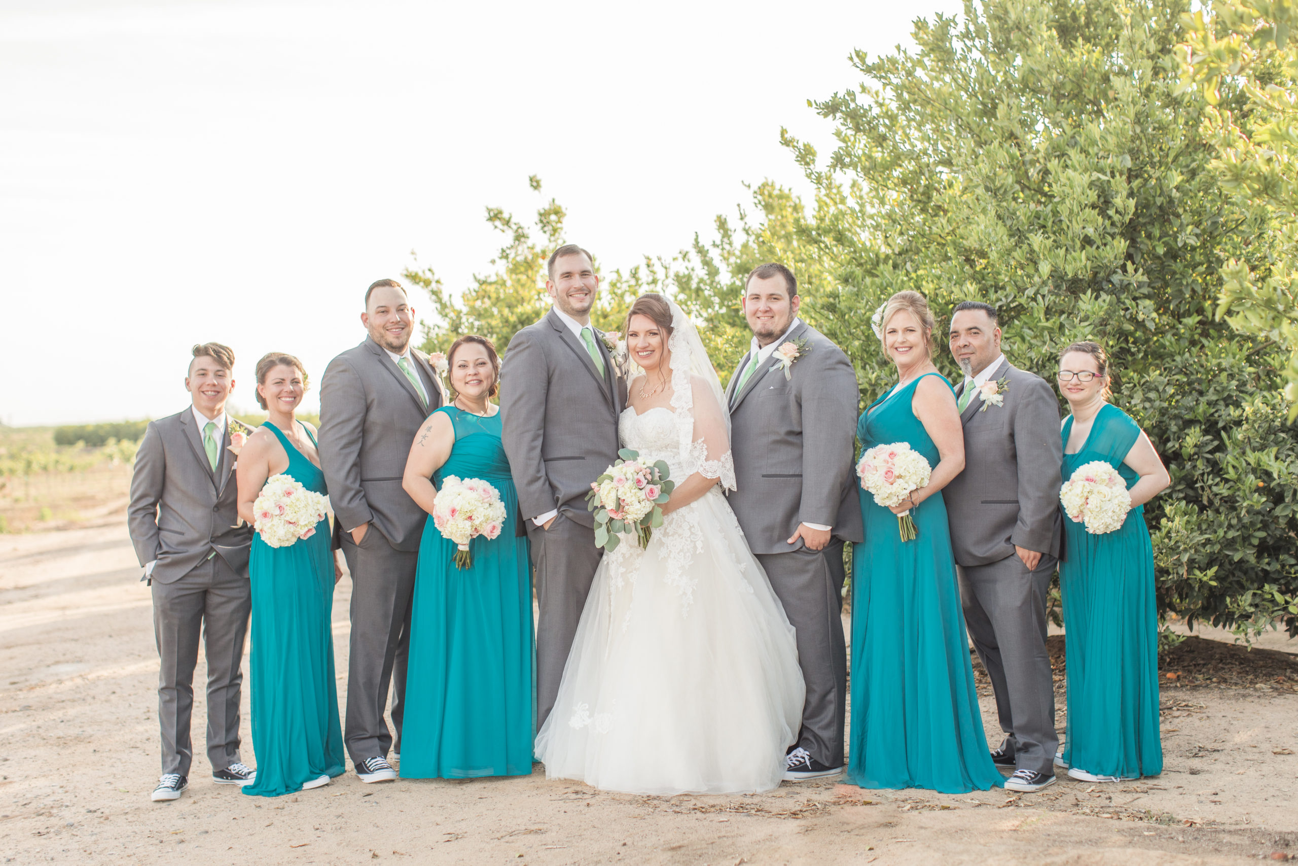A teal Branch and Vine Wedding wedding party
