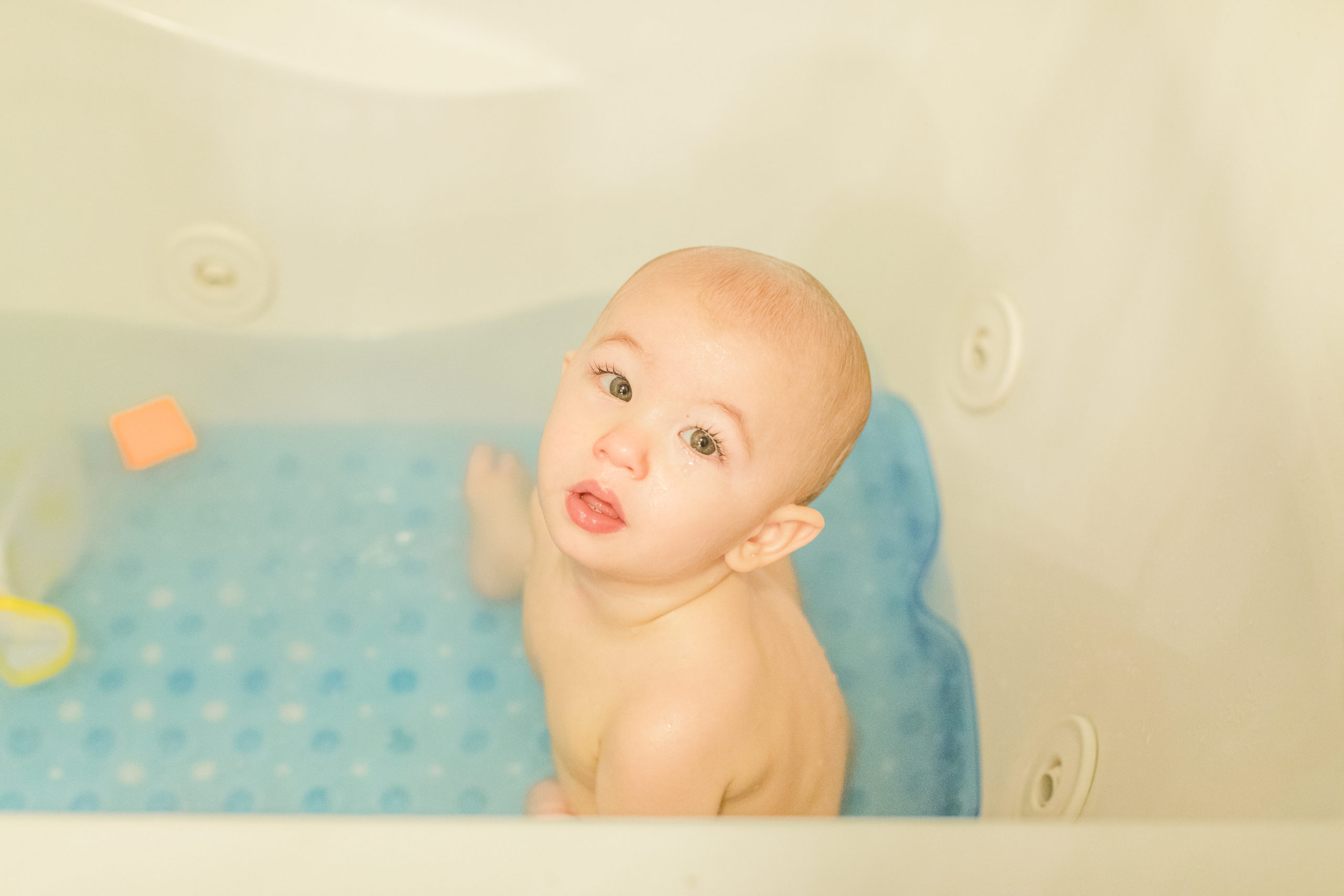 Baby in tub one year