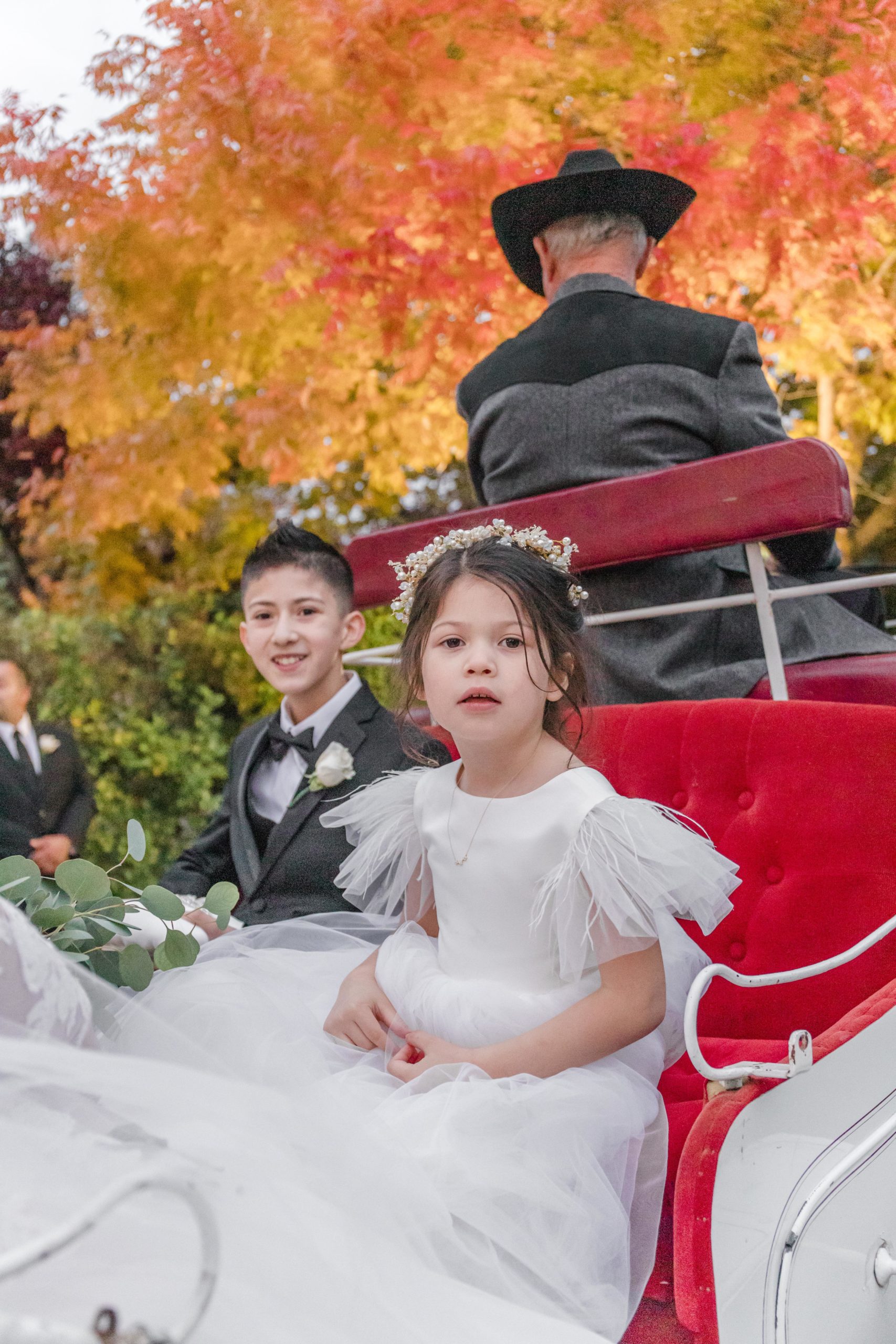 children in carriage - wonder valley ranch wedding